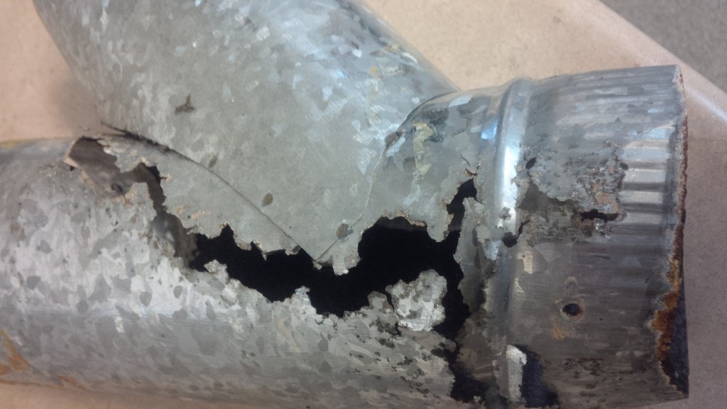 A cracked heat exchanger is never quite as obvious as the crack in the vent pipe above, but a crack of any size should be of equal concern to the health of you and your family.